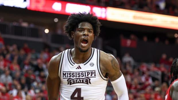 Mississippi State Bulldogs forward Cameron Matthews (4) reacts after a dunk against the Rutgers Scarlet Knights during the second half at Prudential Center.